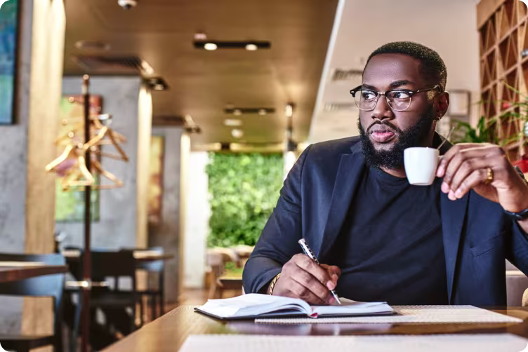 Break times 1 professional man in business suit on break and having a cup of coffee